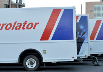 Purolator shipping truck delivering a Fongo package.