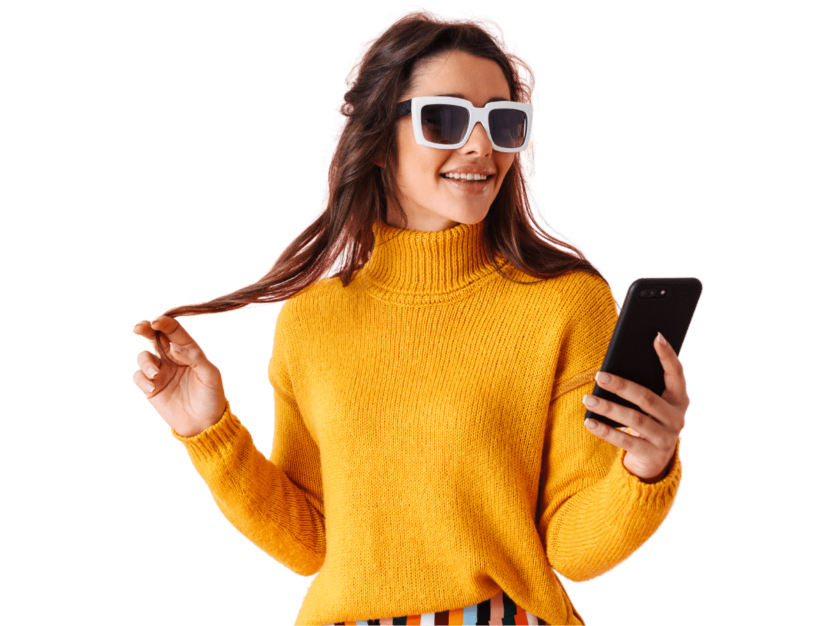 woman with sunglasses looking at her phone